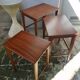 Pull-out tables from the 60s in solid exotic wood published by Younger