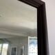 Beveled vintage mirror in painted wood 95x68cm