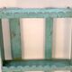 Burmese teak wall shelf with original green patina