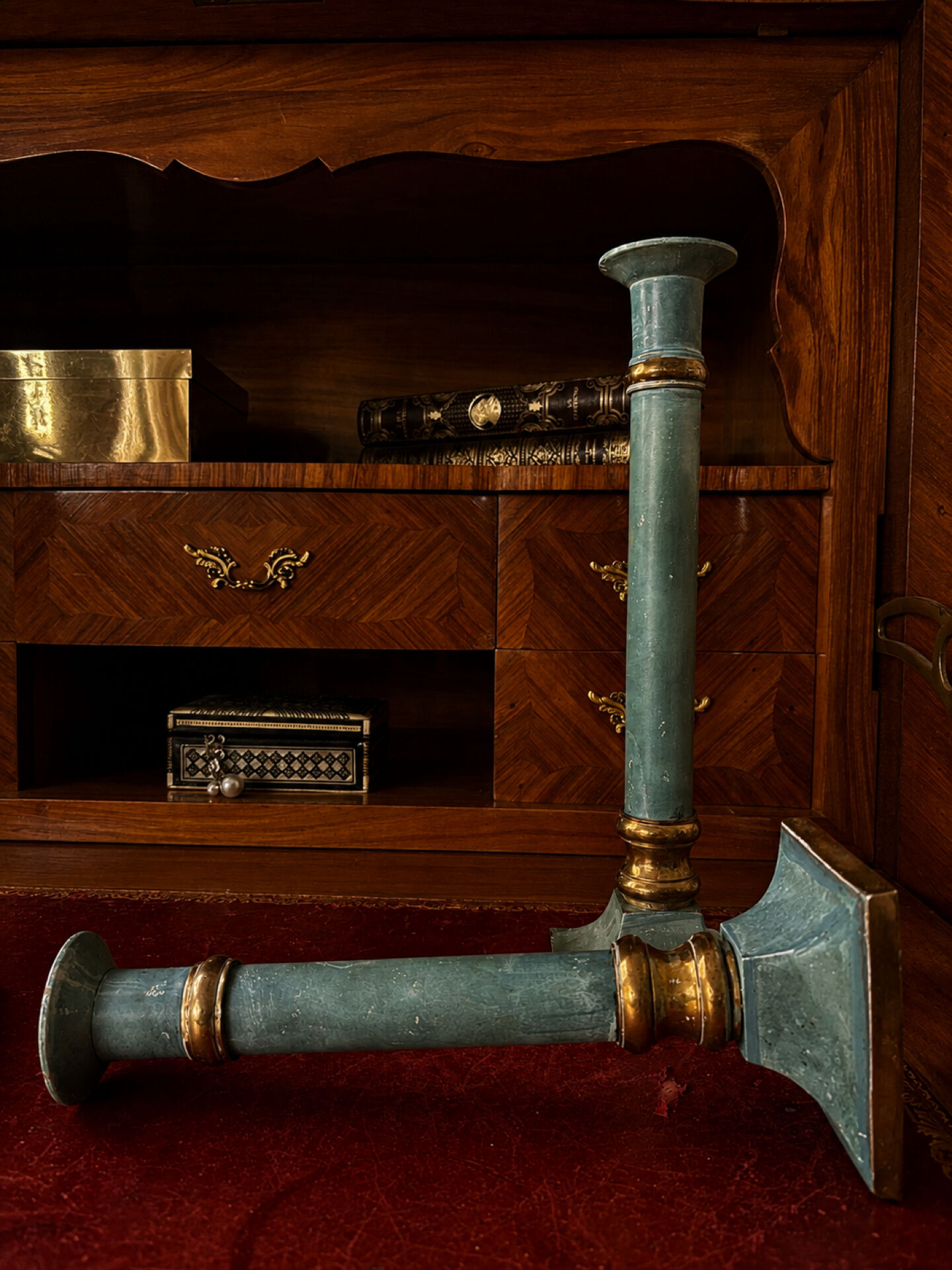 Exceptional pair of large candlesticks in patinated greenish-blue brass.