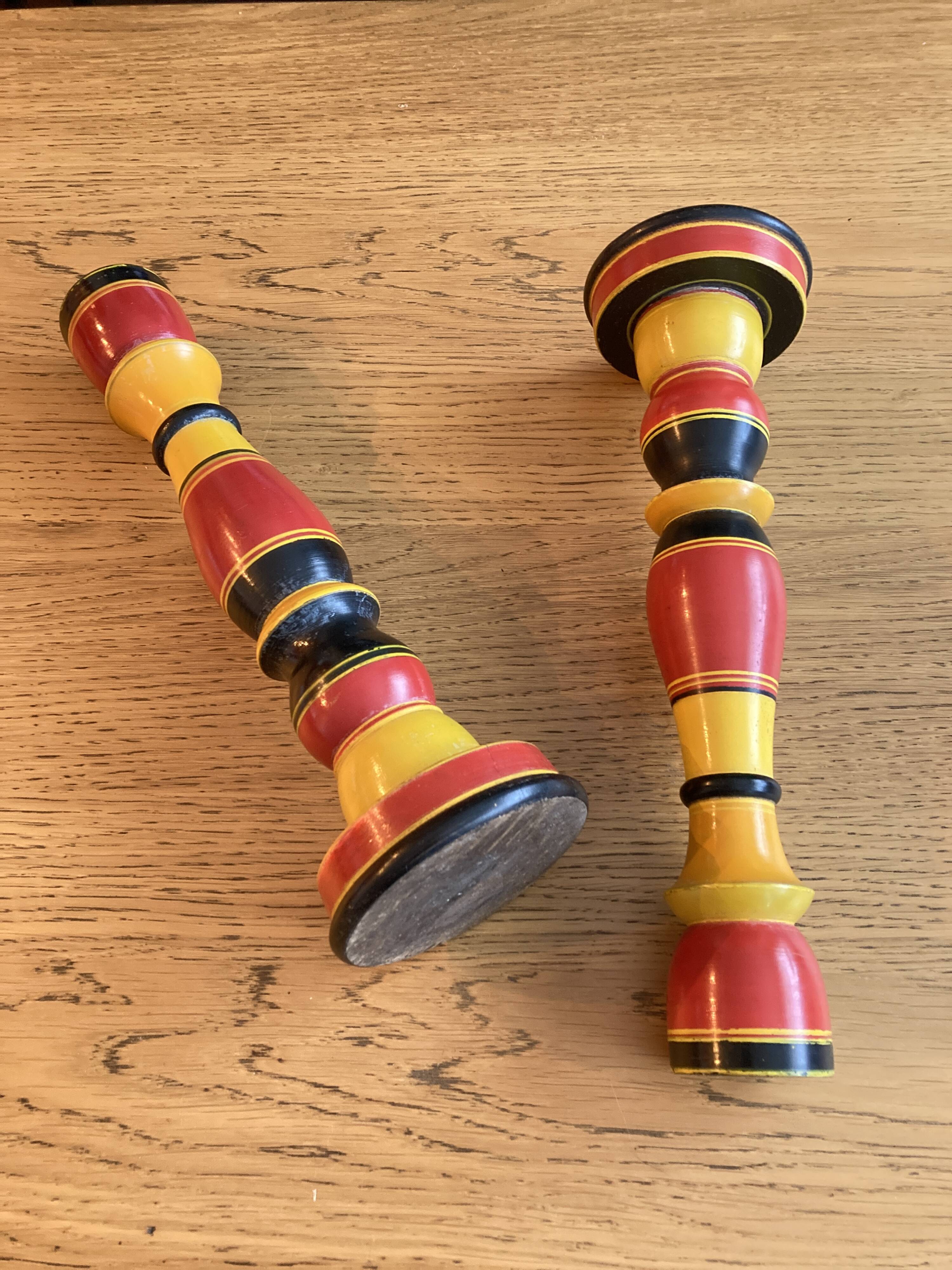 Polychrome turned wooden candlesticks