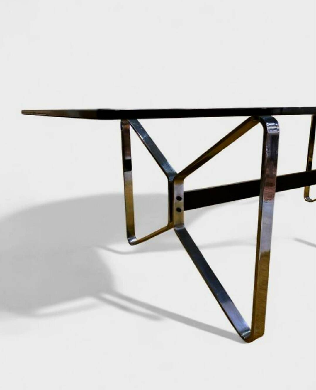 Smoked glass and chrome table design – Italian style from the 1970s.