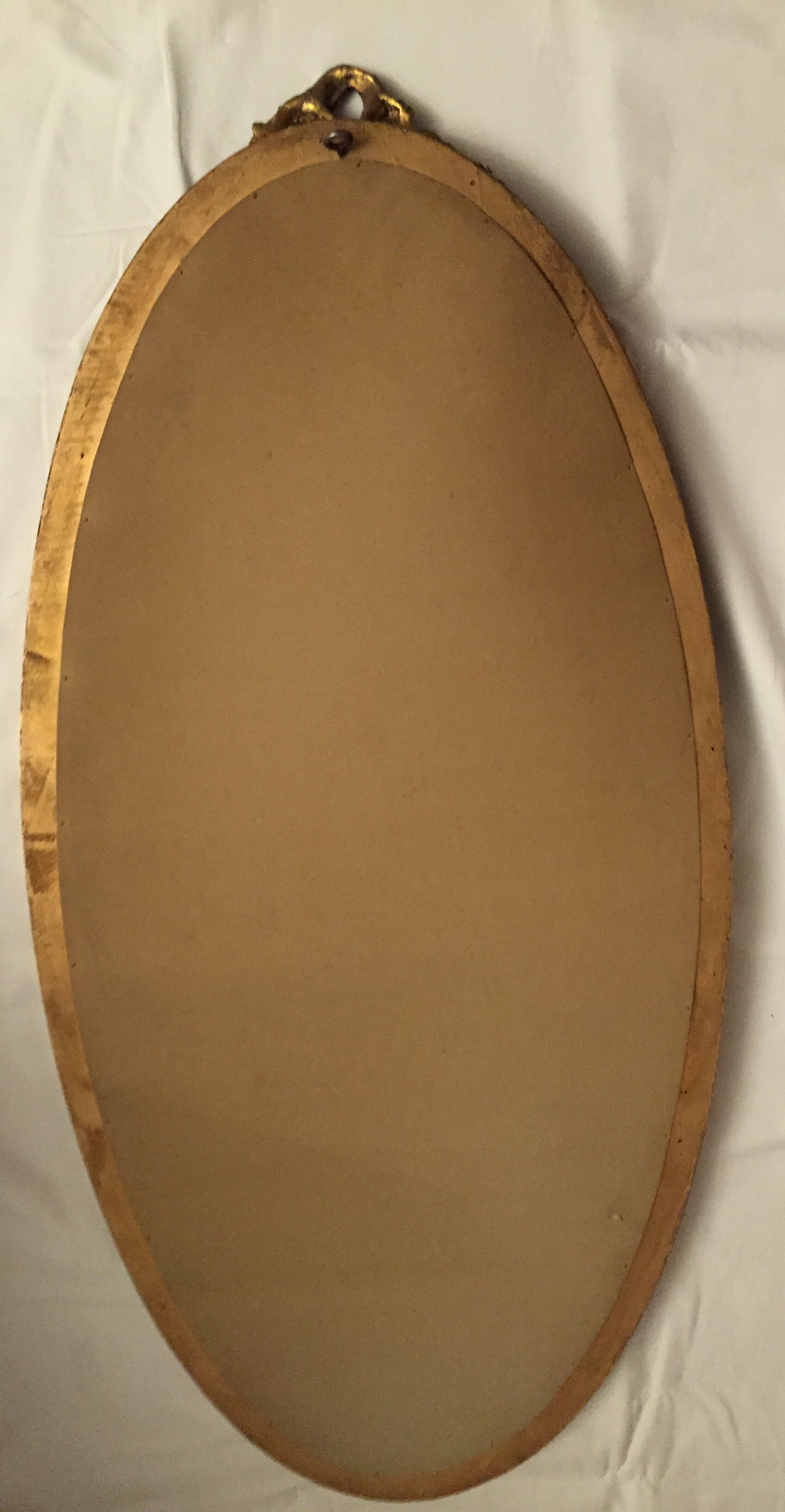 Miroir ovale en bois doré 85x43 cm