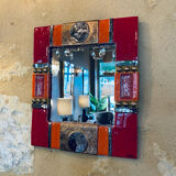 Red and gold glazed ceramic mirror, Marion de Crécy (Mithé workshop)