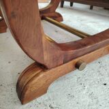 Art Deco extendable table in solid wood and brass.