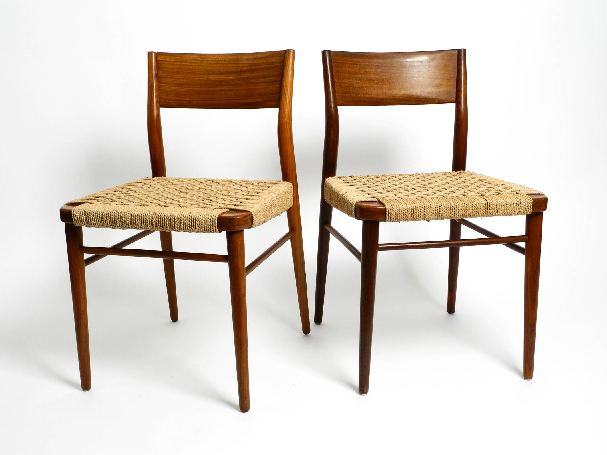 Two original 1960s Wilkhahn chairs made of walnut with wicker cane