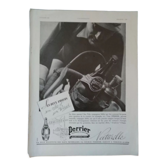 A sparkling water paper advertisement Perrier