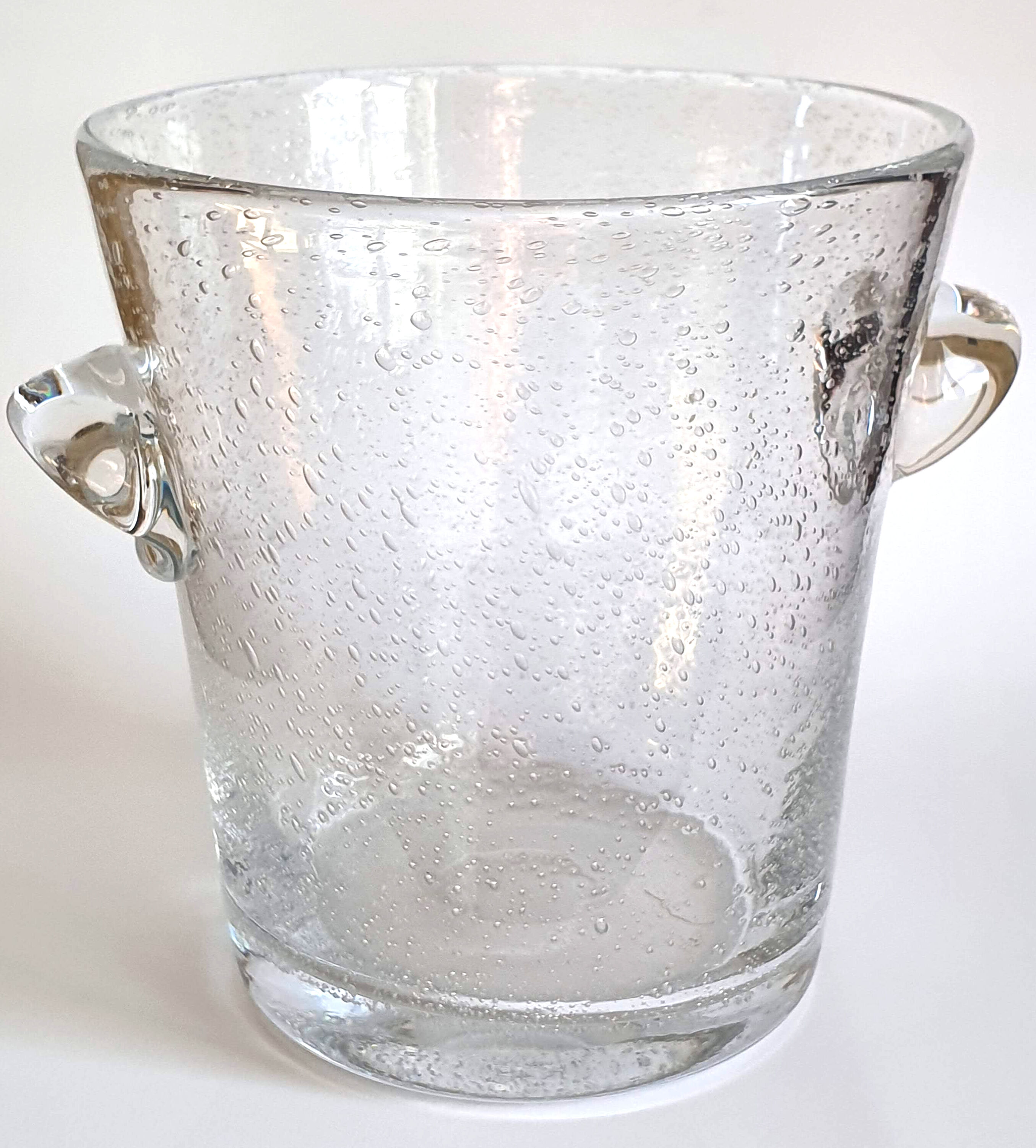 Champagne bucket in glass of biot