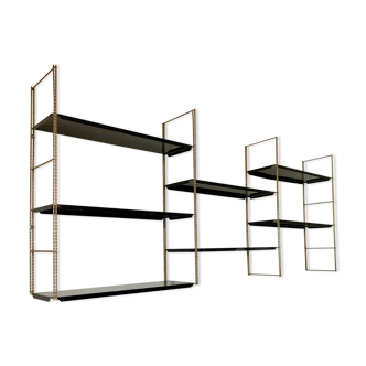 Vintage wall shelves in gold and black metal