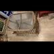 Rattan and frosted glass end table with magazine rack