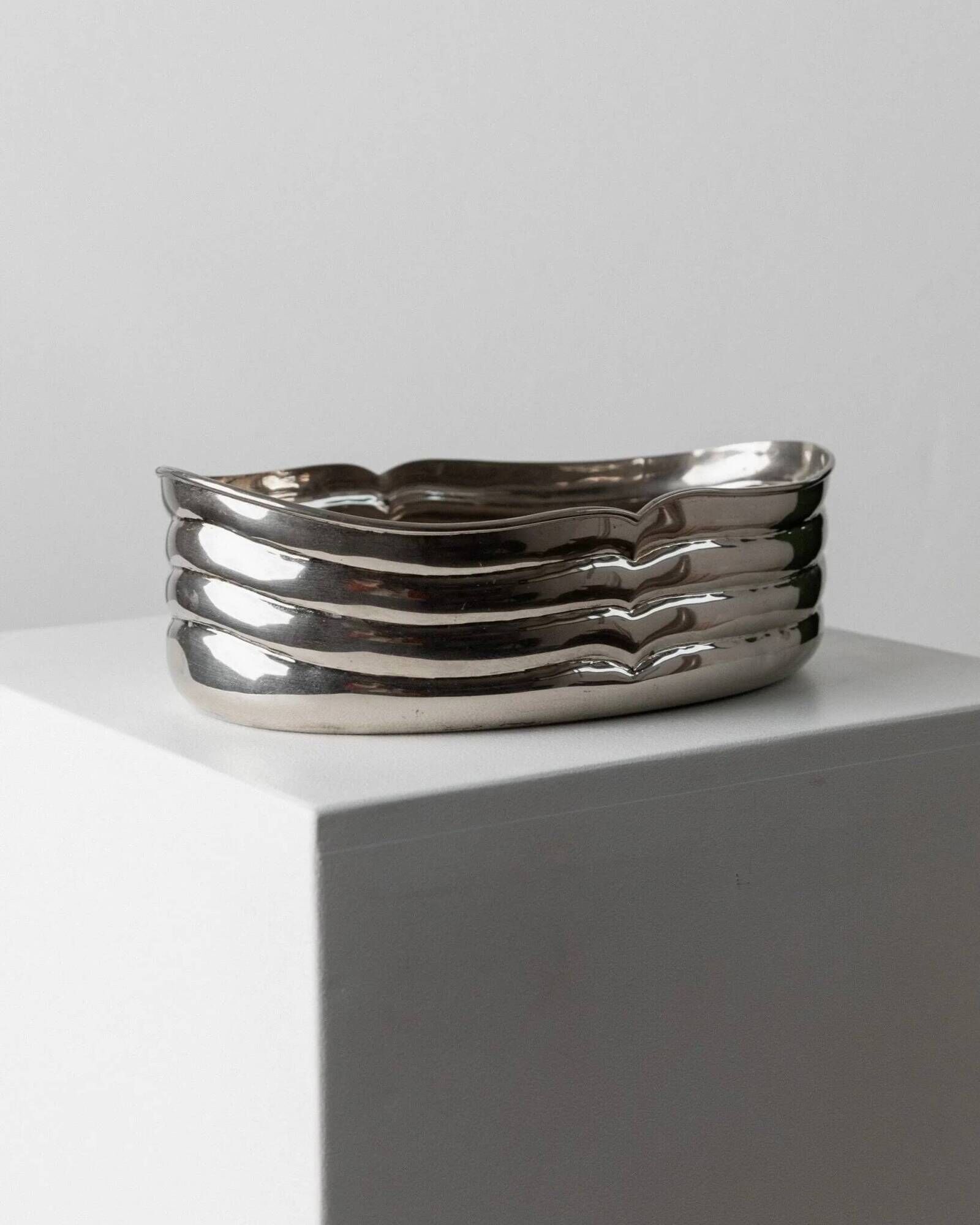 Vintage silver-plated metal bowl with curved relief design, Italy 1960s, elegant appetizer plate