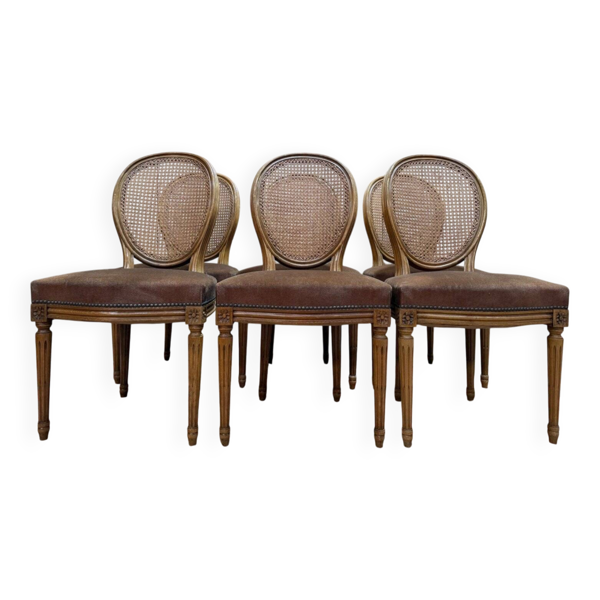 Set of 6 Louis XVI medallion chairs in wood and caning.