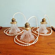 Art Deco trio of pendant lights/table lamps in clear glass, 1920s-30s.