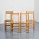 Suite de quatre chaises en pin massif par Maison Regain