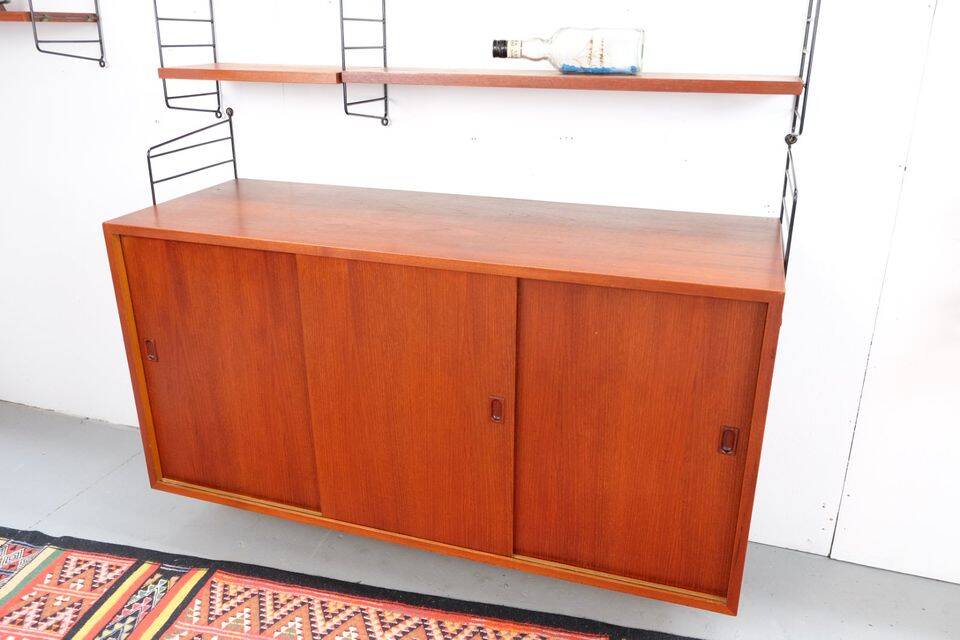 Nisse String shelf in teak, retro vintage style from the 60s-70s.