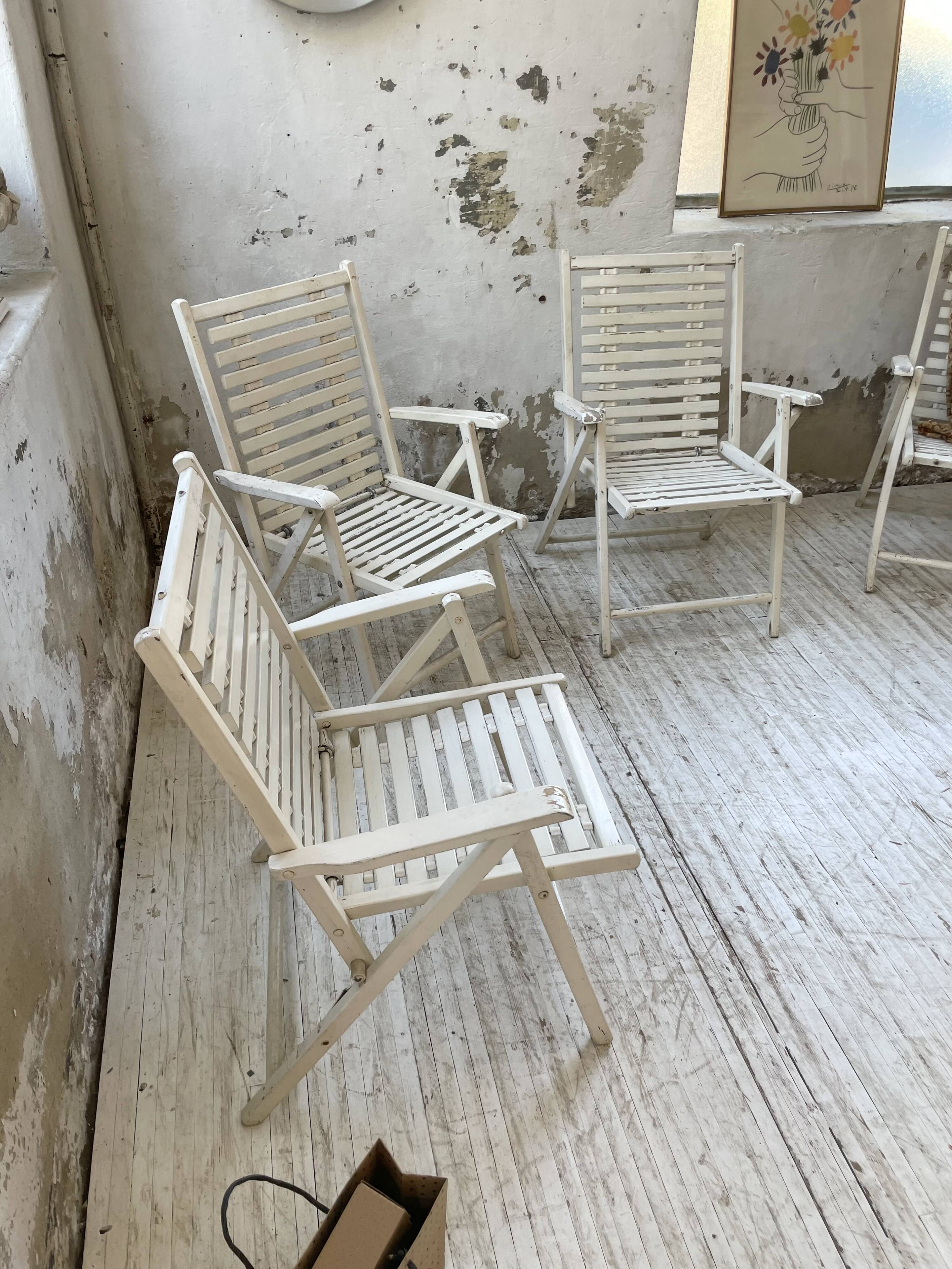 4 white wooden garden chairs