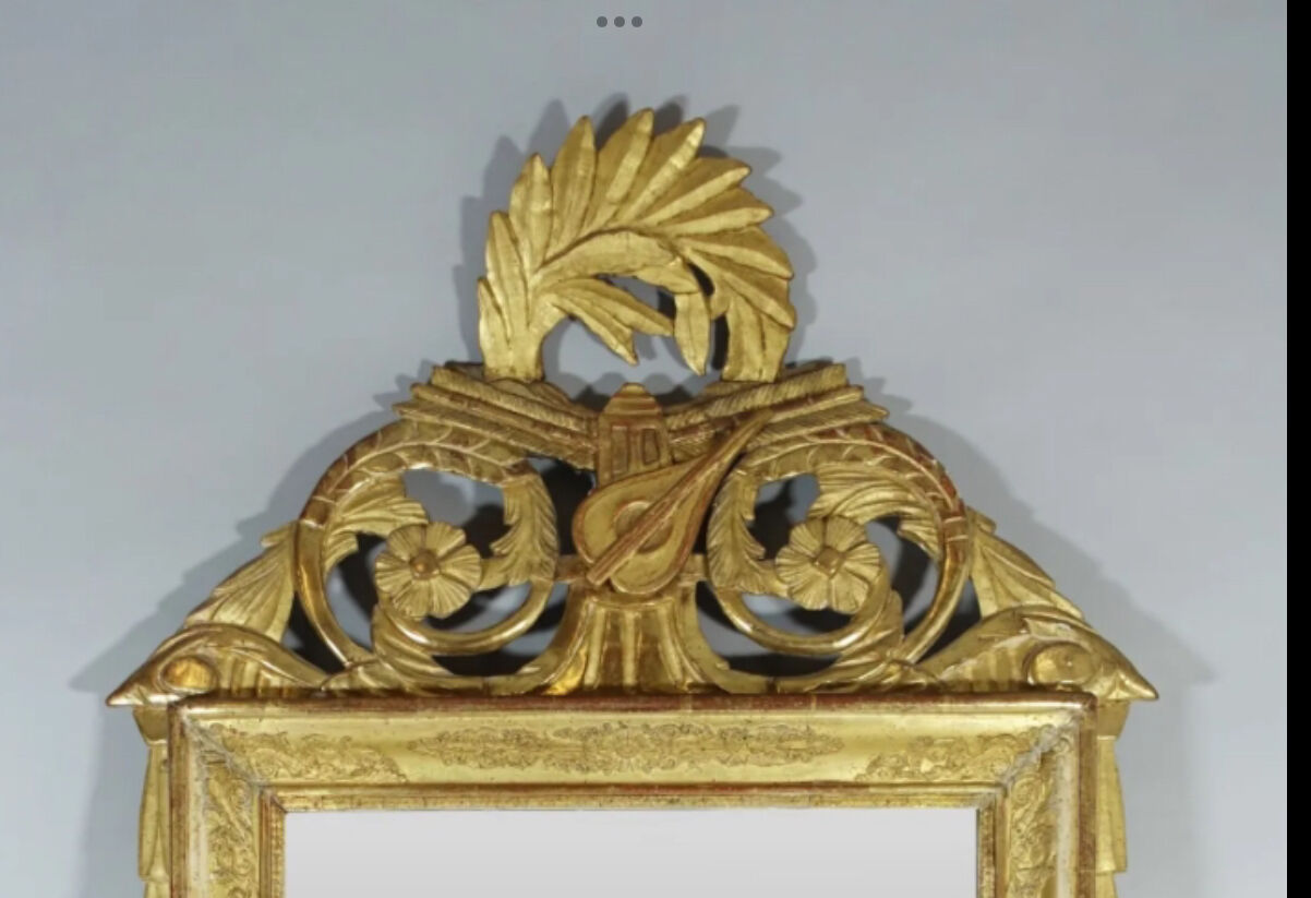 Superb Louis XVI style mirror in wood and gilded stucco nineteenth century