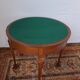 A half-moon english mahogany games table