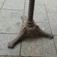 Old bistro table with marble top and cast iron base.