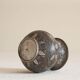 Antique pyriform Bidri vase in the shape of a pyramid.