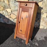 Old wooden bedside table