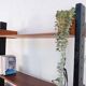 Vintage teak shelving system in 60s-70s style, retro style.