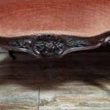 Very large Louis XV style mahogany banquette with medallions from the 19th century.