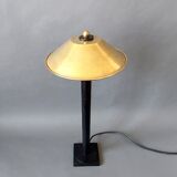 Post-Modern lamp in black metal and gilded brass.