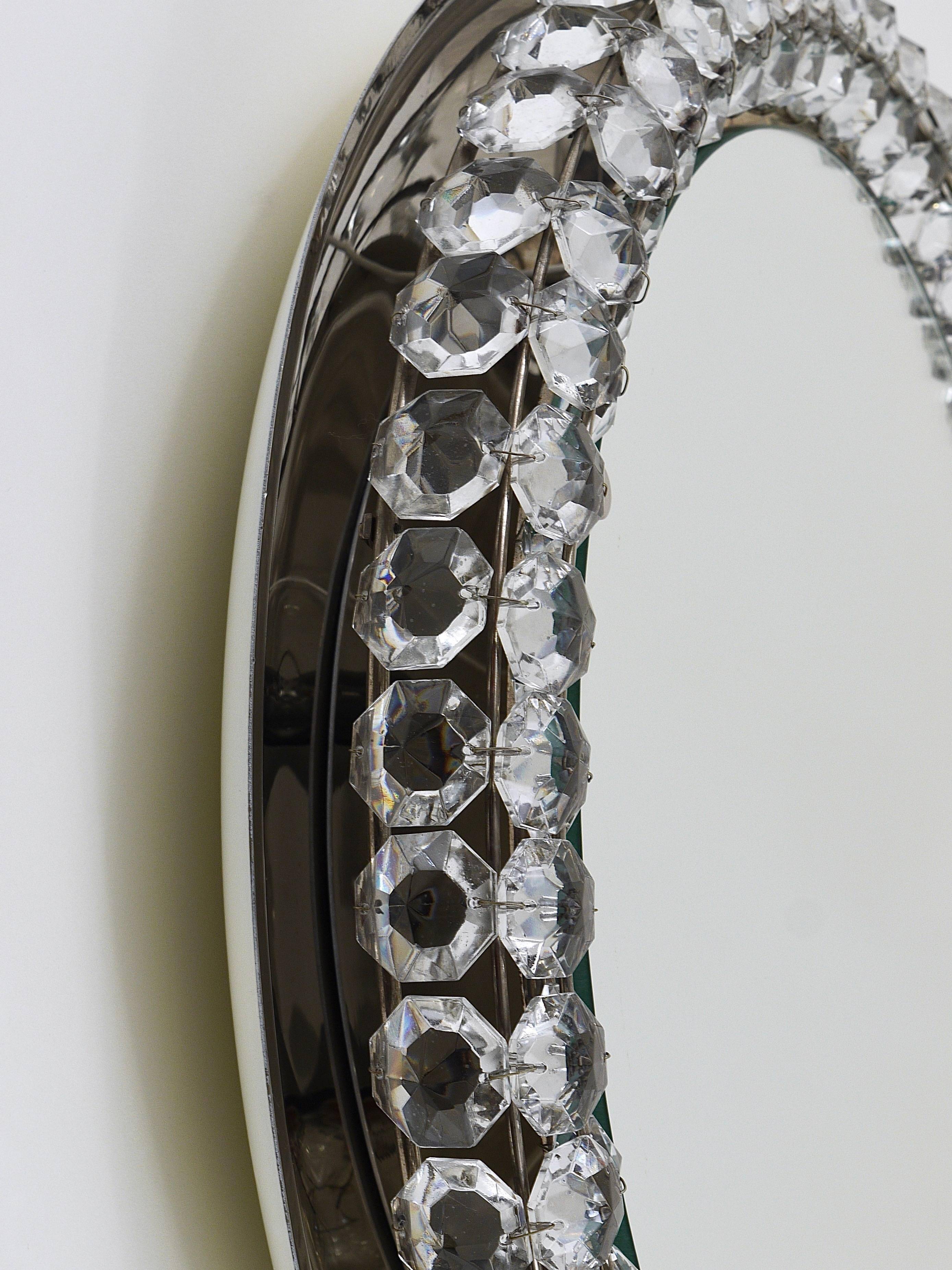Backlit circular wall mirror Bakalowits Vienna with large crystals, Austria, 1950s