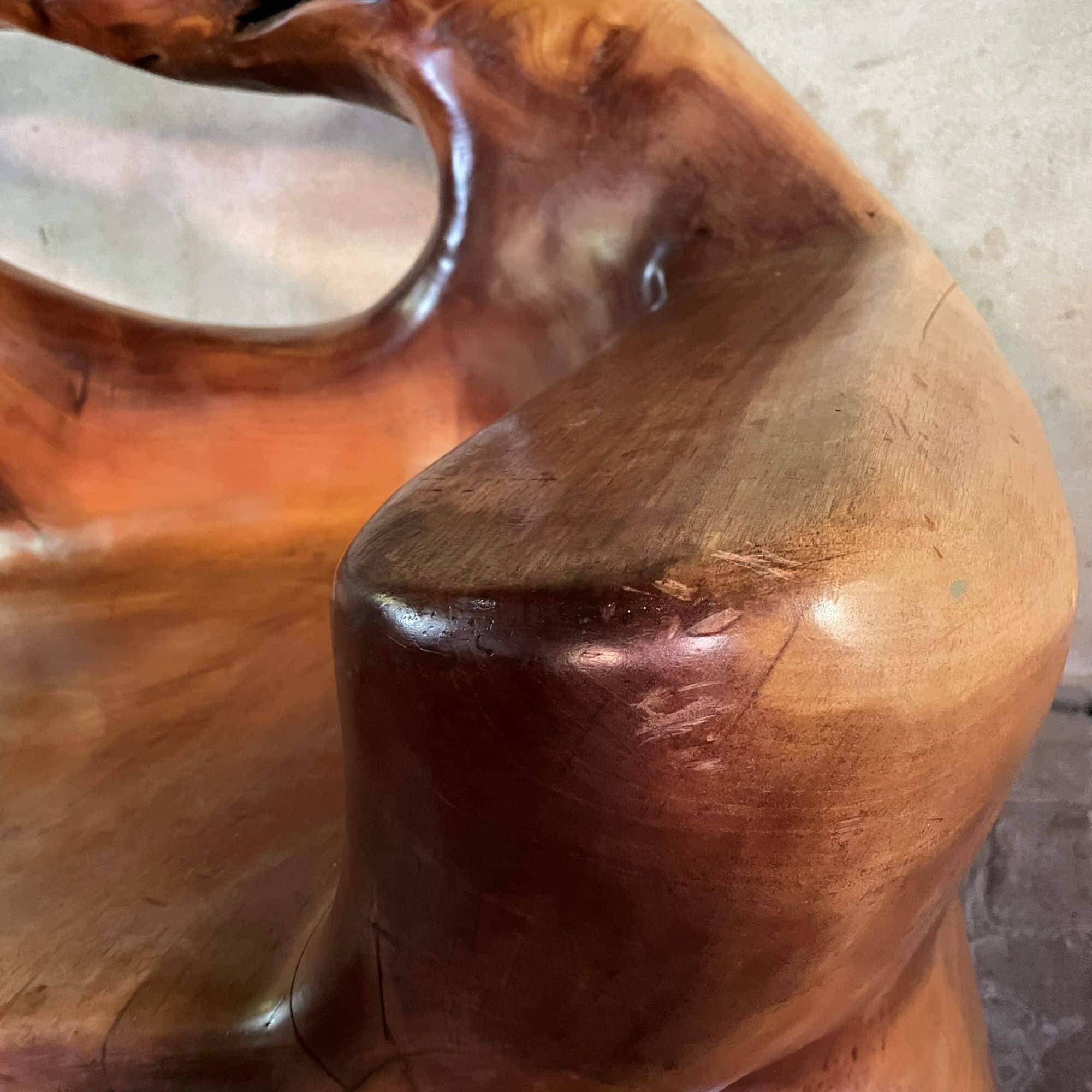 Sculptural solid wooden bench