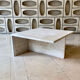 Square travertine coffee table by Giusti and Di Rosa for UP&UP