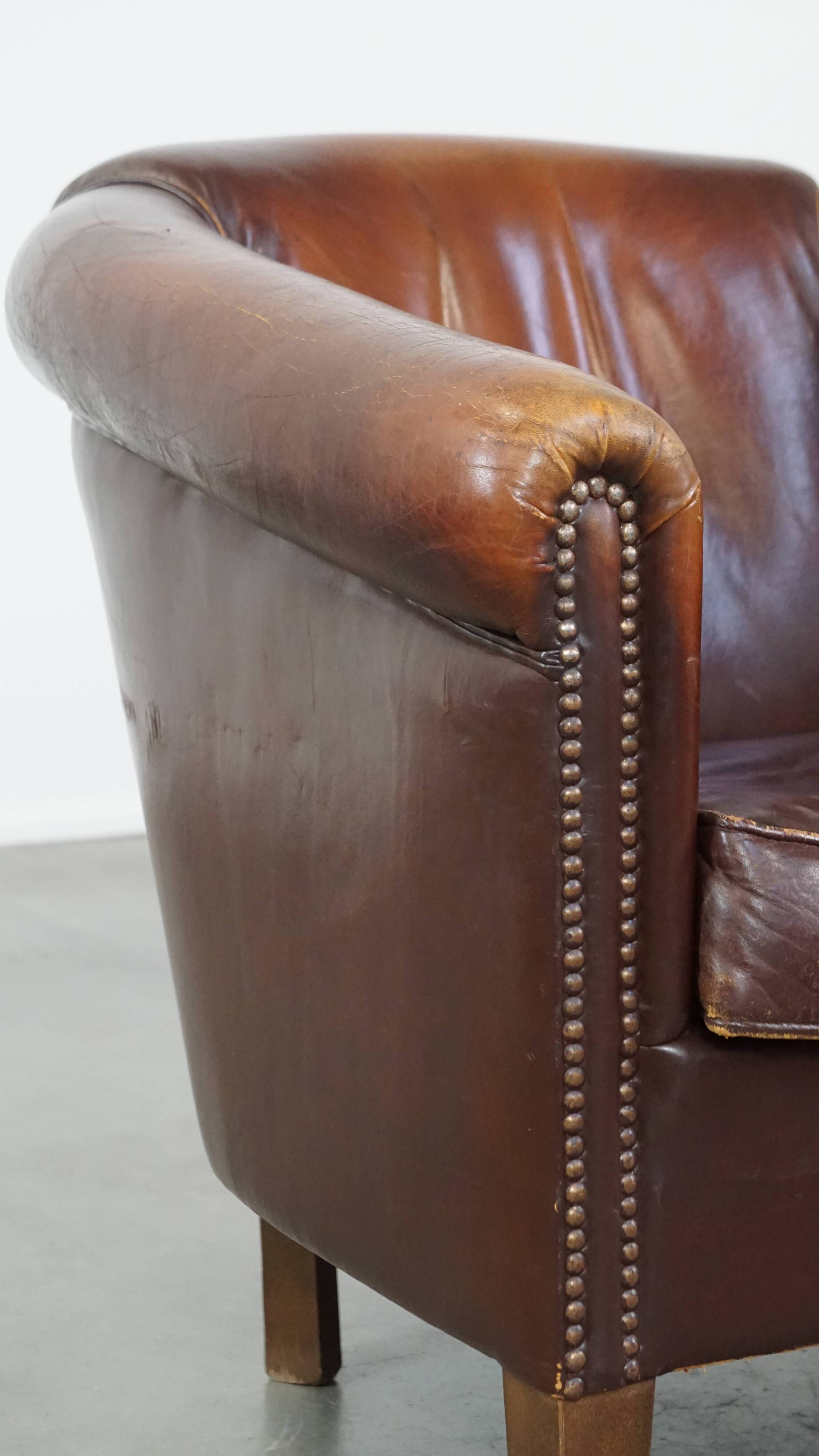 Vintage club armchair made of sheep leather