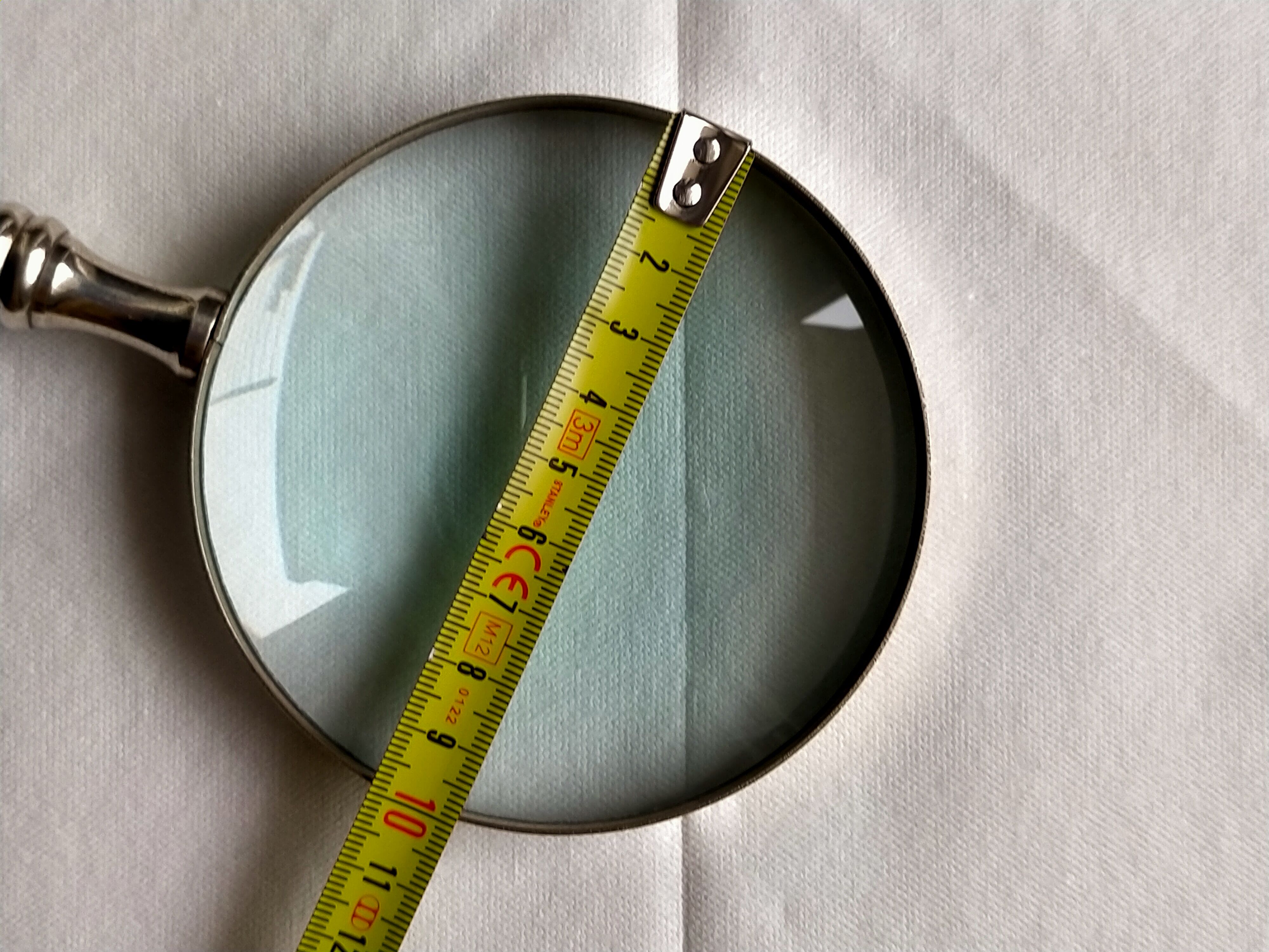 Magnifying glass set and letter opens in silver metal and mother-of-pearl