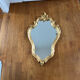 Miroir rocaille en bois doré