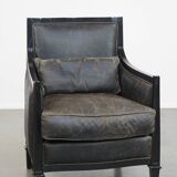Black Art Deco design cow leather and wooden armchair with loose cushion
