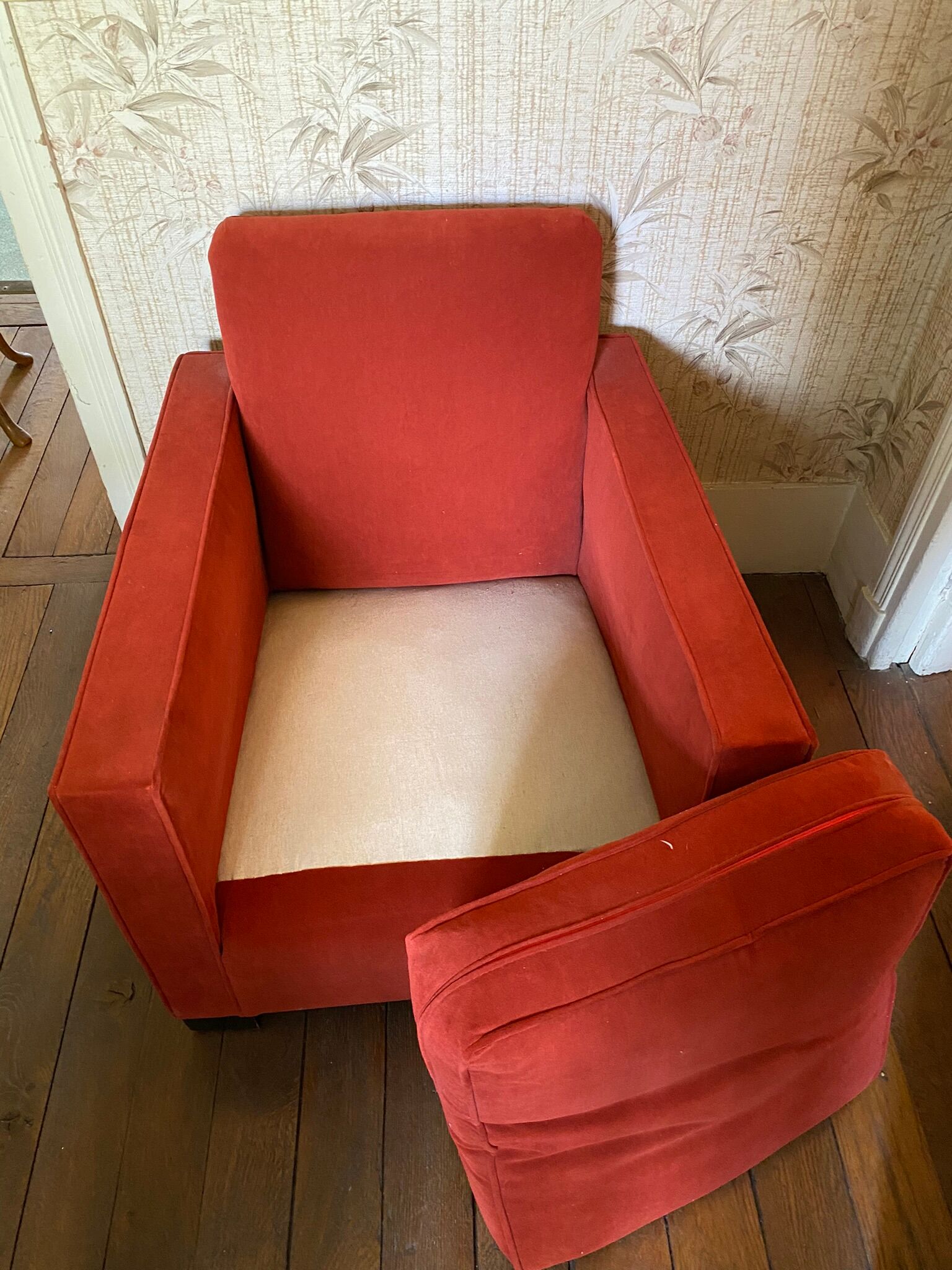 Vintage cubic armchair covered with red fabric