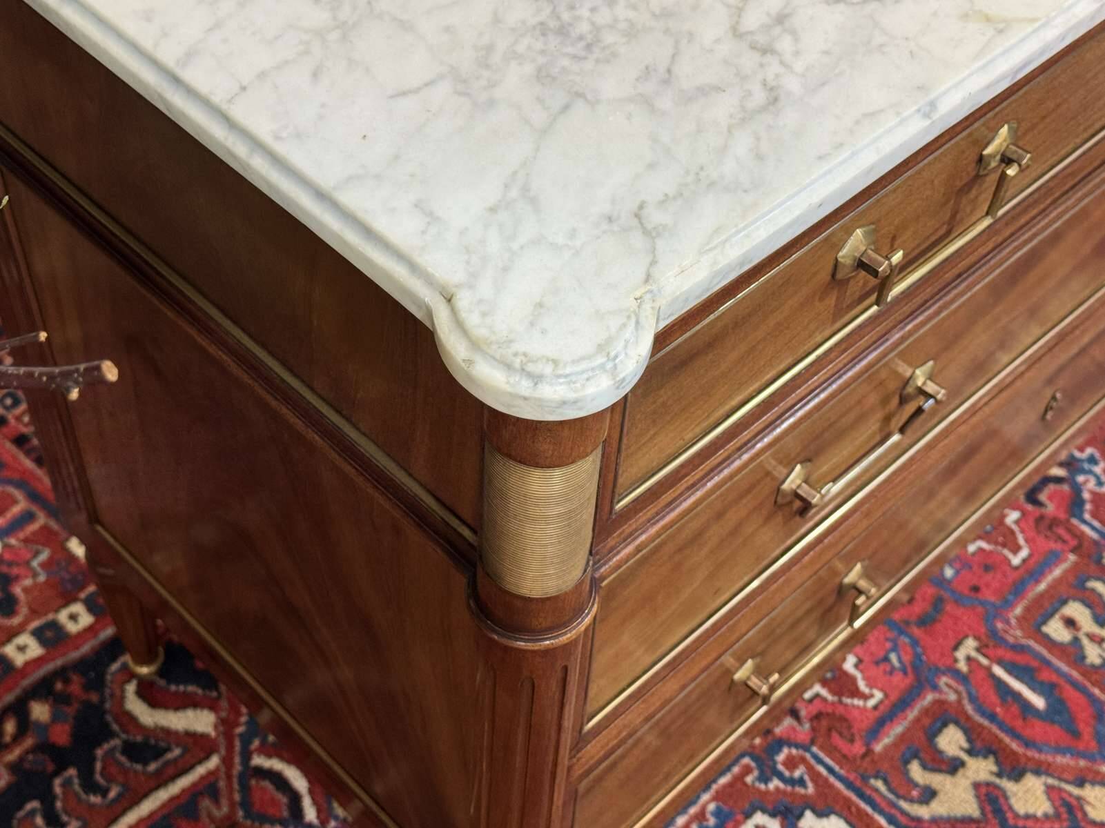 Louis XVI commode in mahogany with a marble top from the 1950s.