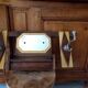 Vintage Art Deco wall coat rack in two-tone wood with engraved mirror.