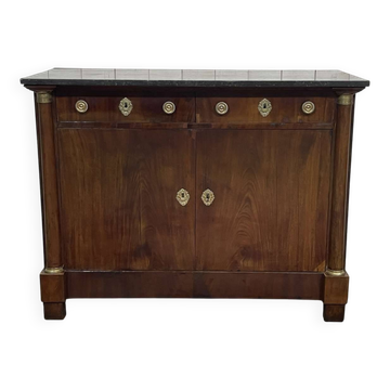 Empire buffet from the early 19th century in mahogany with a black marble top.