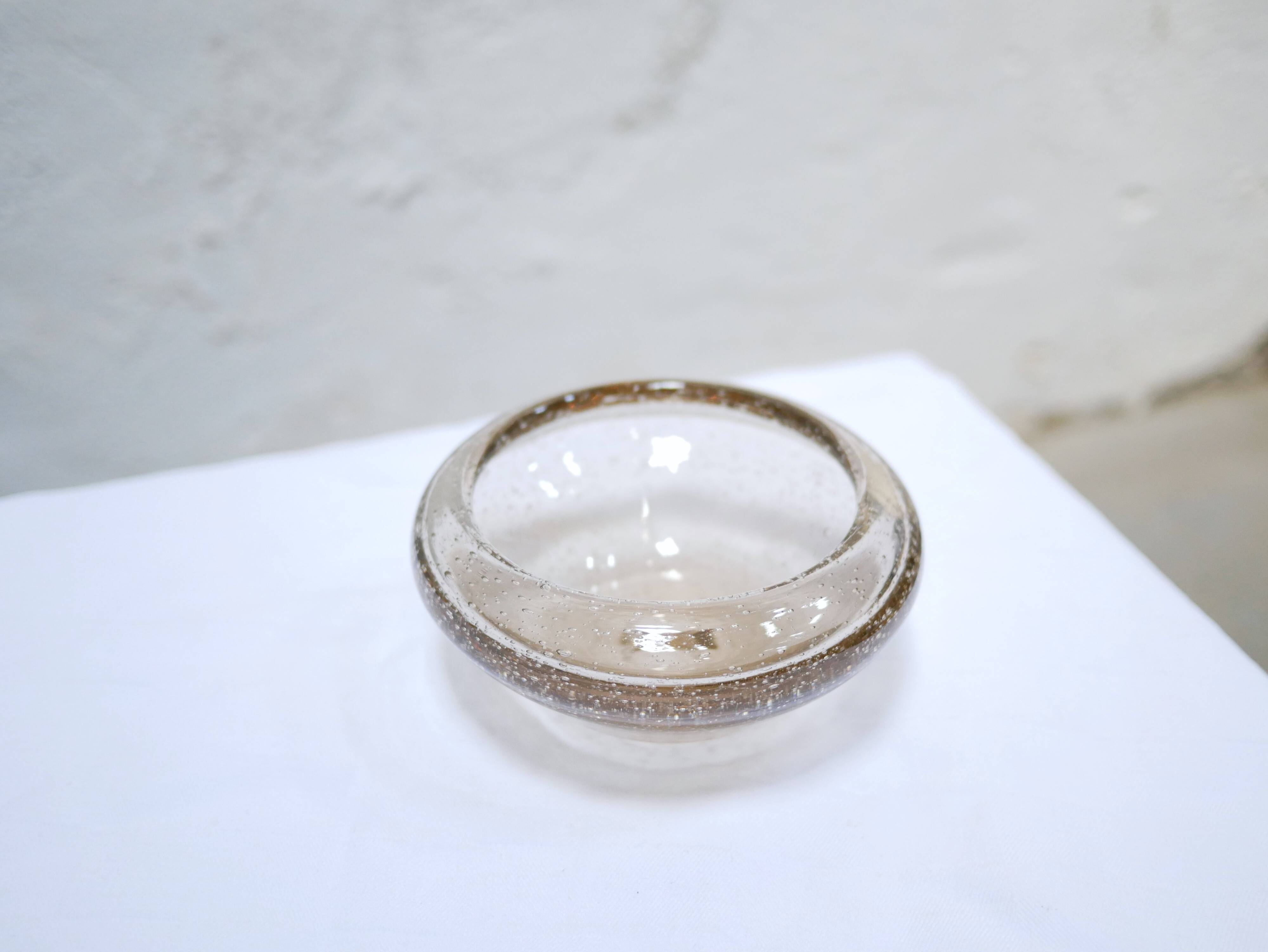 Empty vintage glass pocket blown by the glassworks of Biot