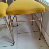 Pair of vintage golden designer chairs from the 50s