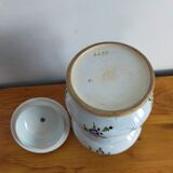 Vintage antique pharmacy jar in earthenware floral patterns