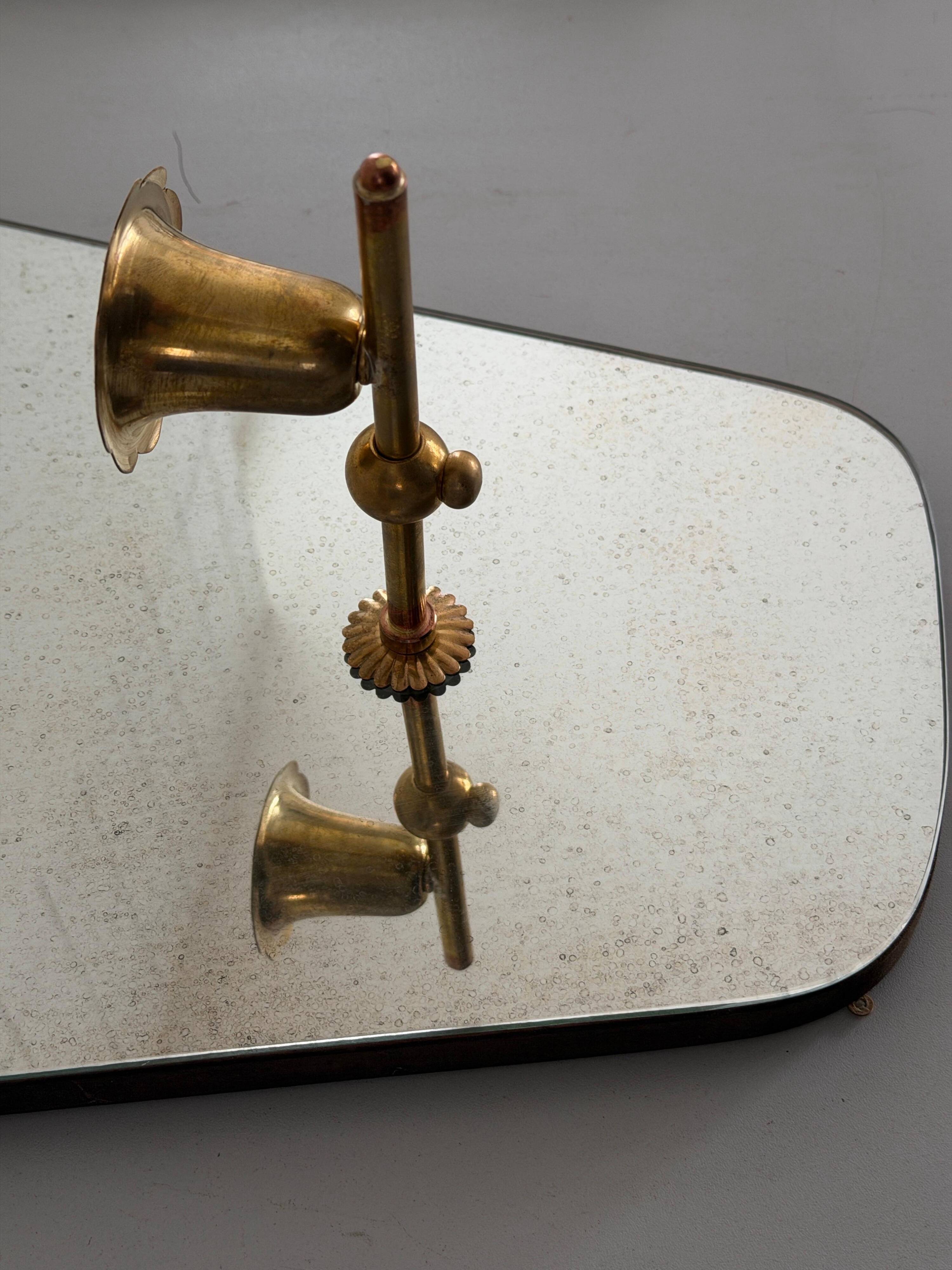 Pair of brass wall lights with mirrors, mid-20th century, Italy, 1960.