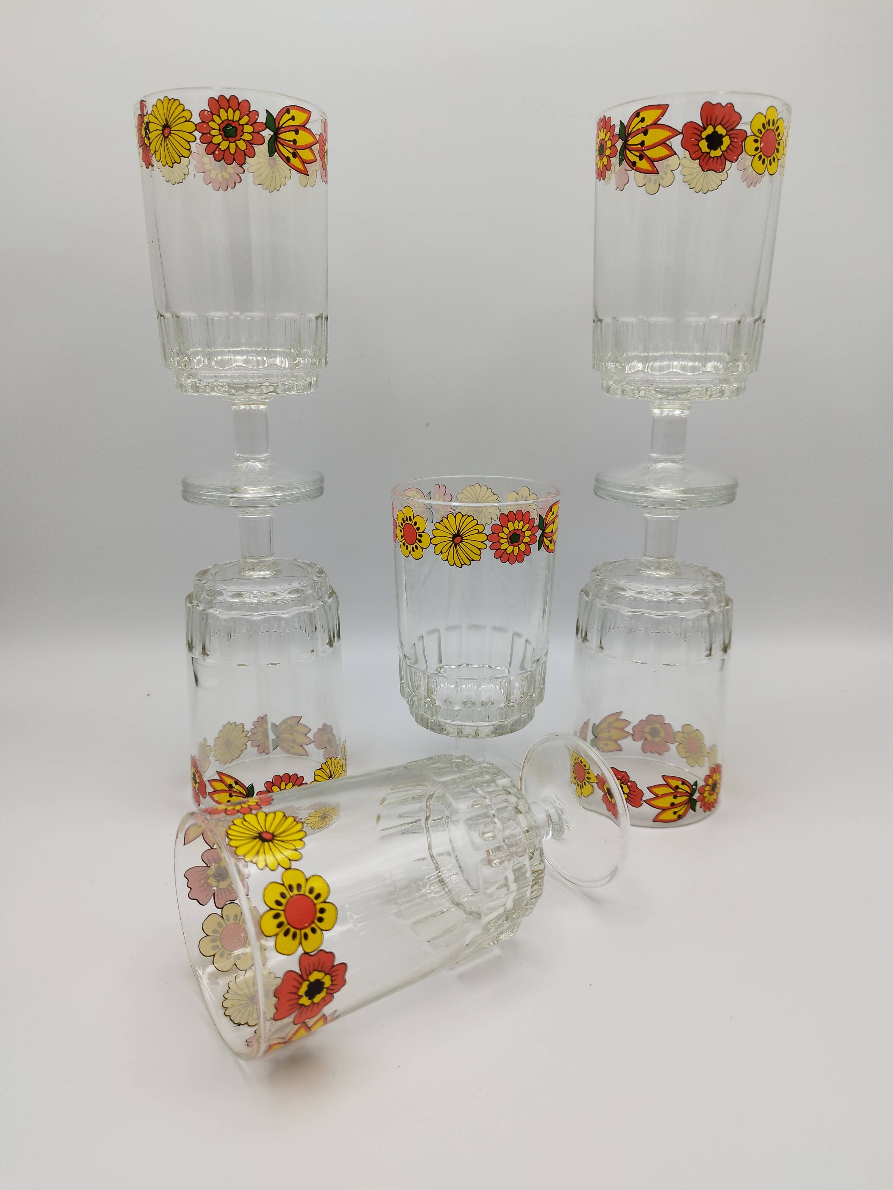 Vintage stemmed glass with floral decoration