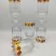 Vintage stemmed glass with floral decoration