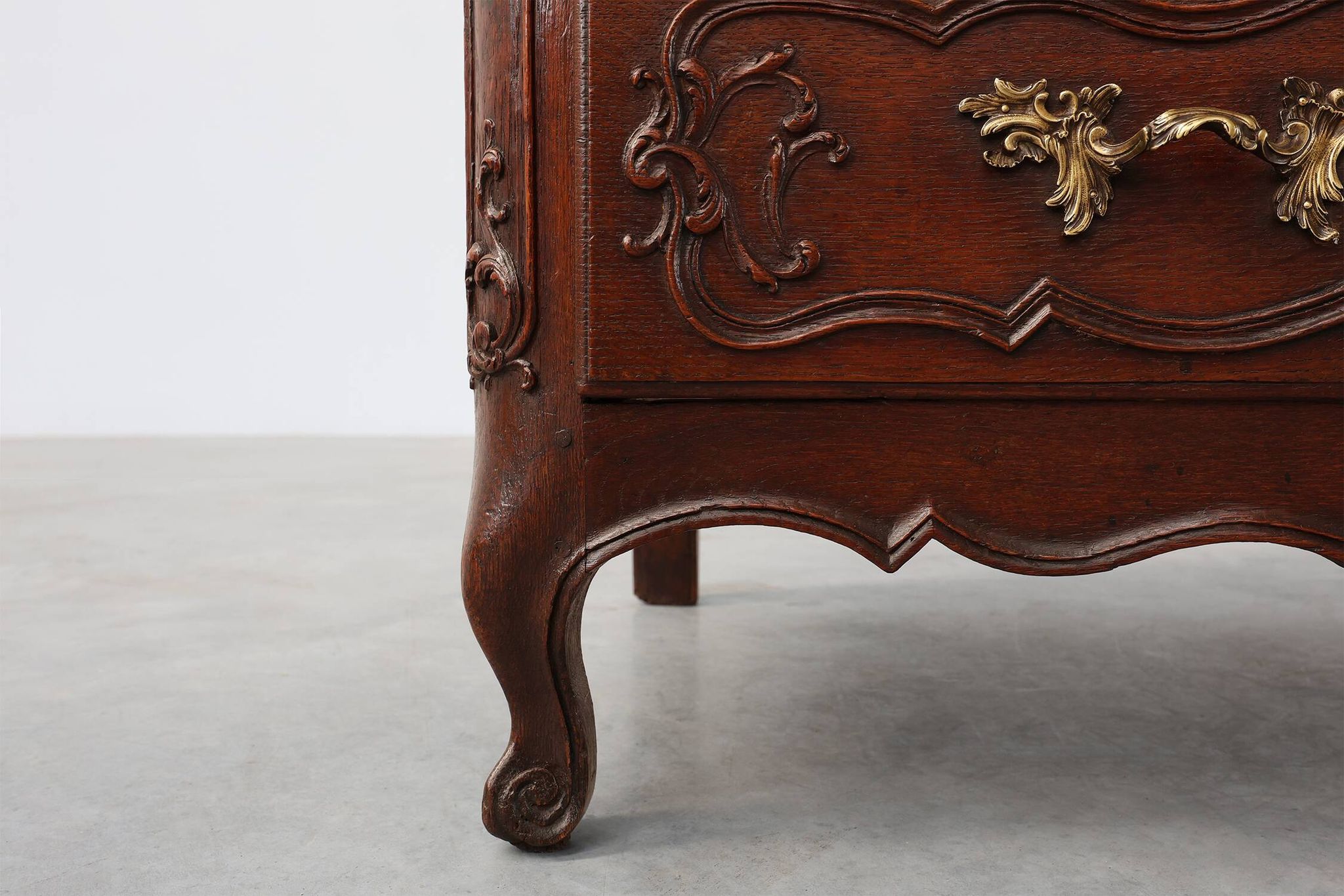 French 18th Century hand crafted oak chest of drawers in Louis XV style