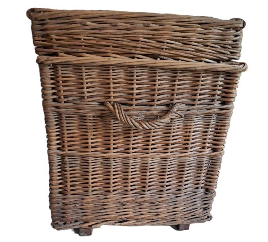 Wicker travel trunk XIX with metal clasps and handles.