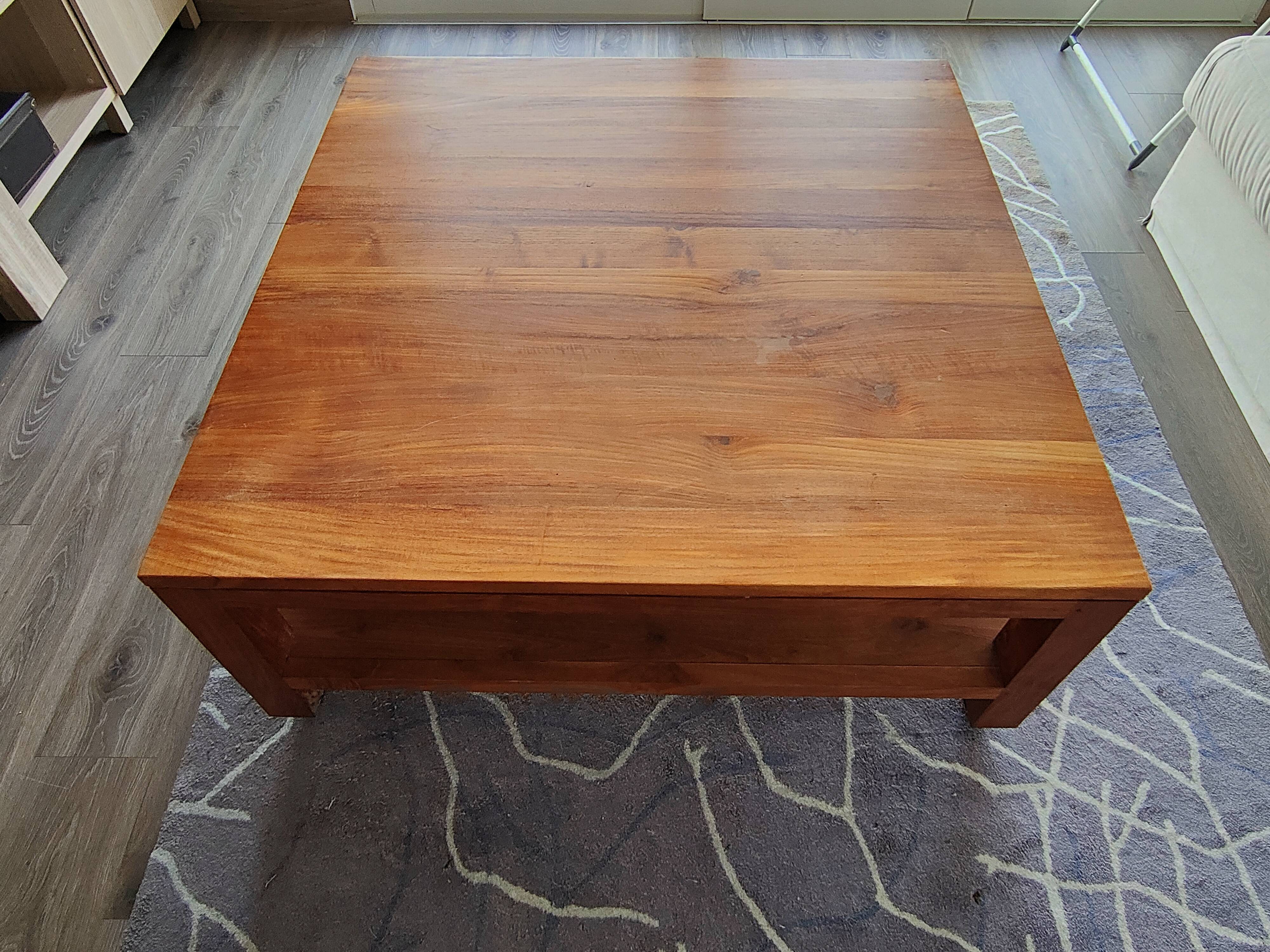 Coffee table for the living room in solid teak.