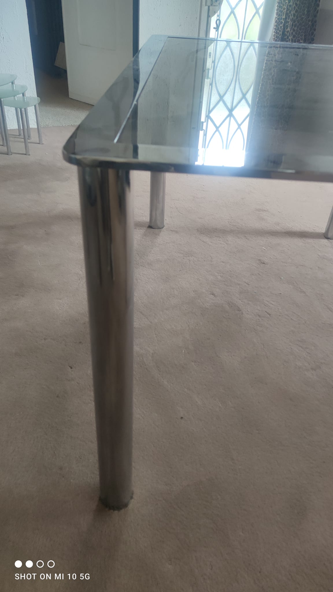 Dining table in chromed steel and smoked glass top, 1969
