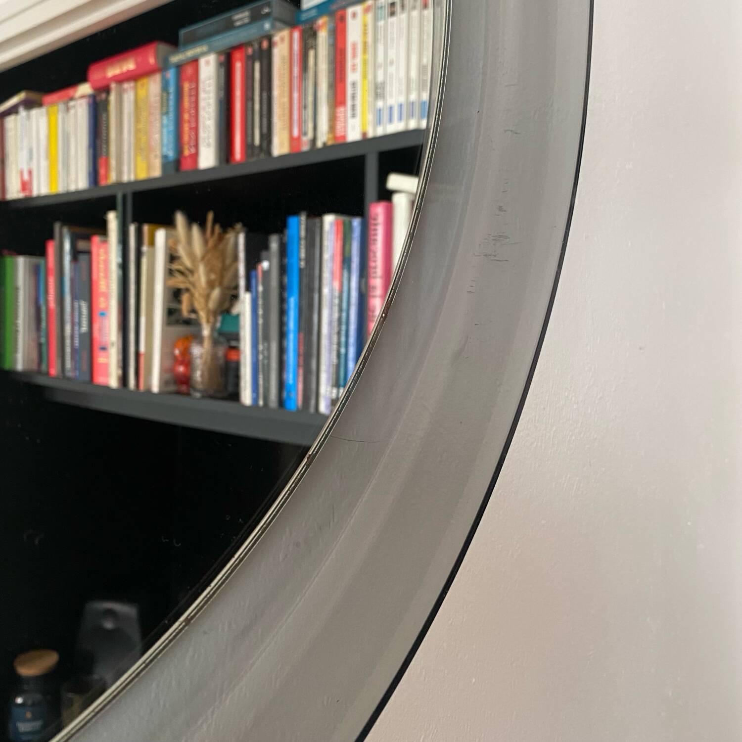 Round bluish plexiglass mirror